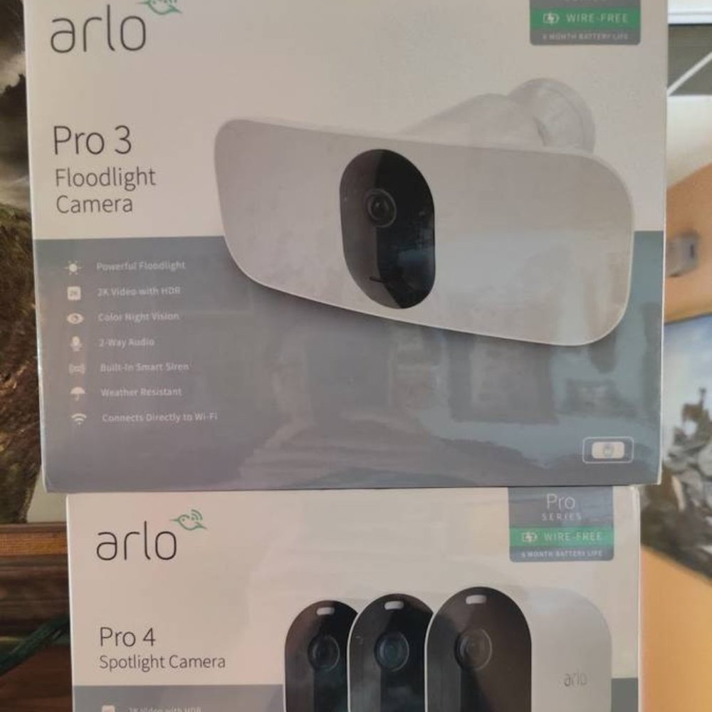 NEW IN BOX Arlo Pro 4 - 3 Pack and Arlo Pro 3 Floodlight Camera